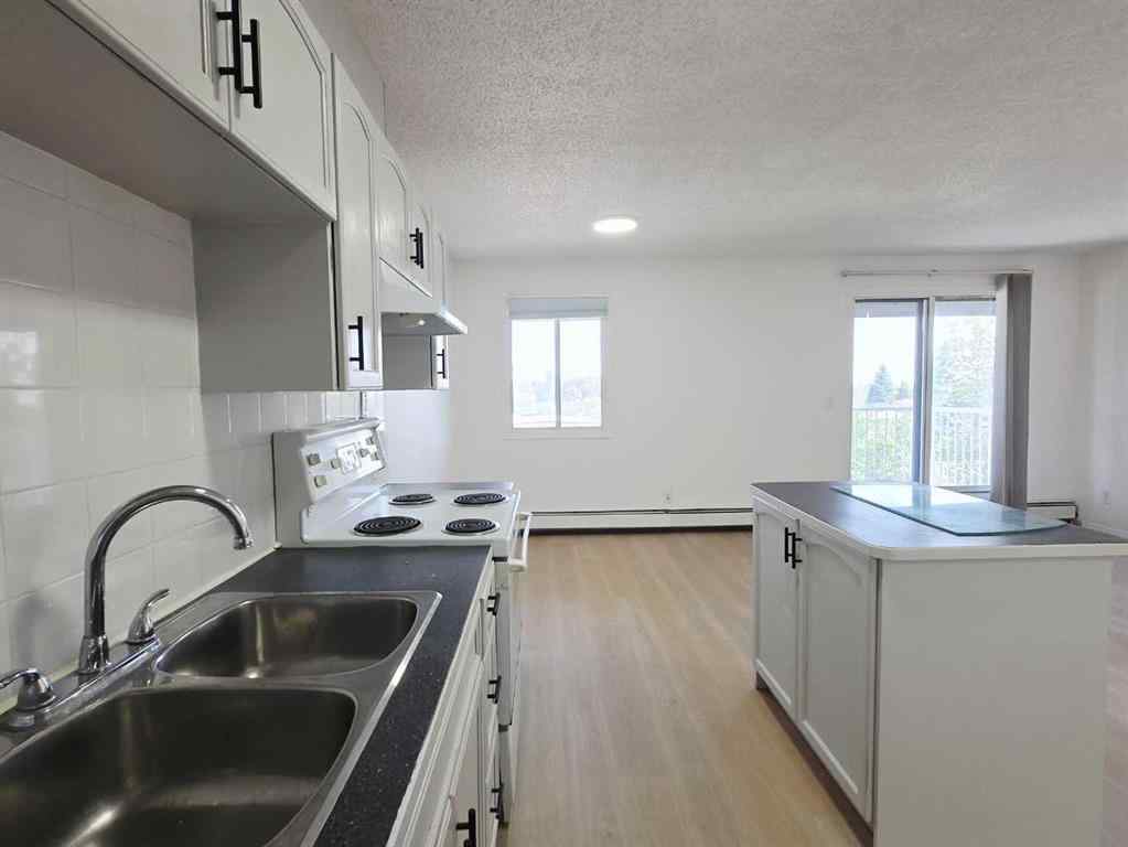 MLS® A2258812 - Unit #302 6825 Centre Street NW in Huntington Hills Calgary, Residential