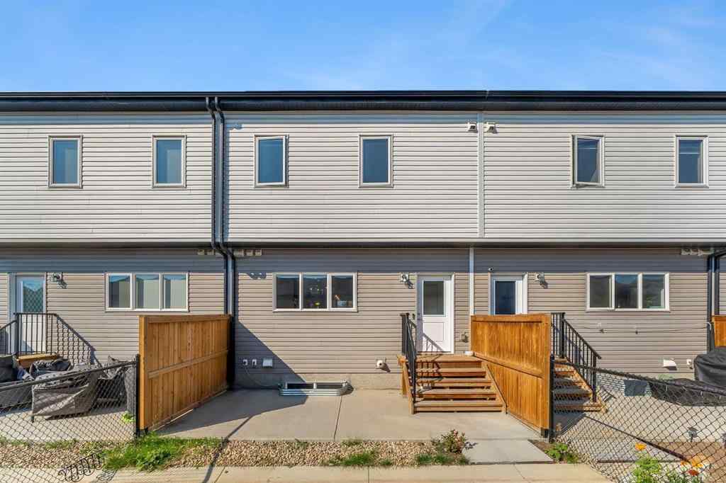 MLS® A2258813 - 72 Creekside Boulevard SW in Pine Creek Calgary, Residential