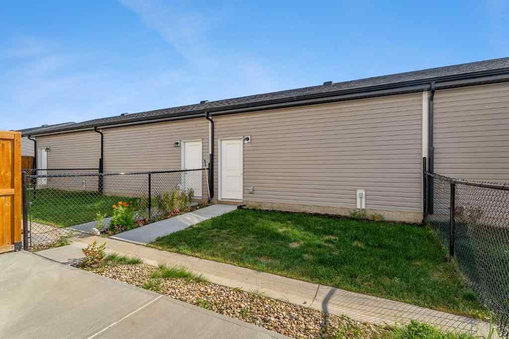 MLS® A2258813 - 72 Creekside Boulevard SW in Pine Creek Calgary, Residential