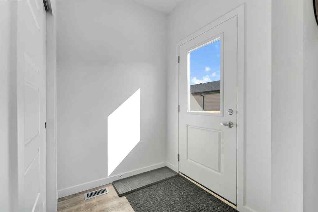 MLS® A2258813 - 72 Creekside Boulevard SW in Pine Creek Calgary, Residential