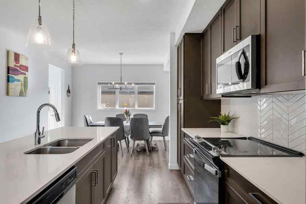 MLS® A2258813 - 72 Creekside Boulevard SW in Pine Creek Calgary, Residential