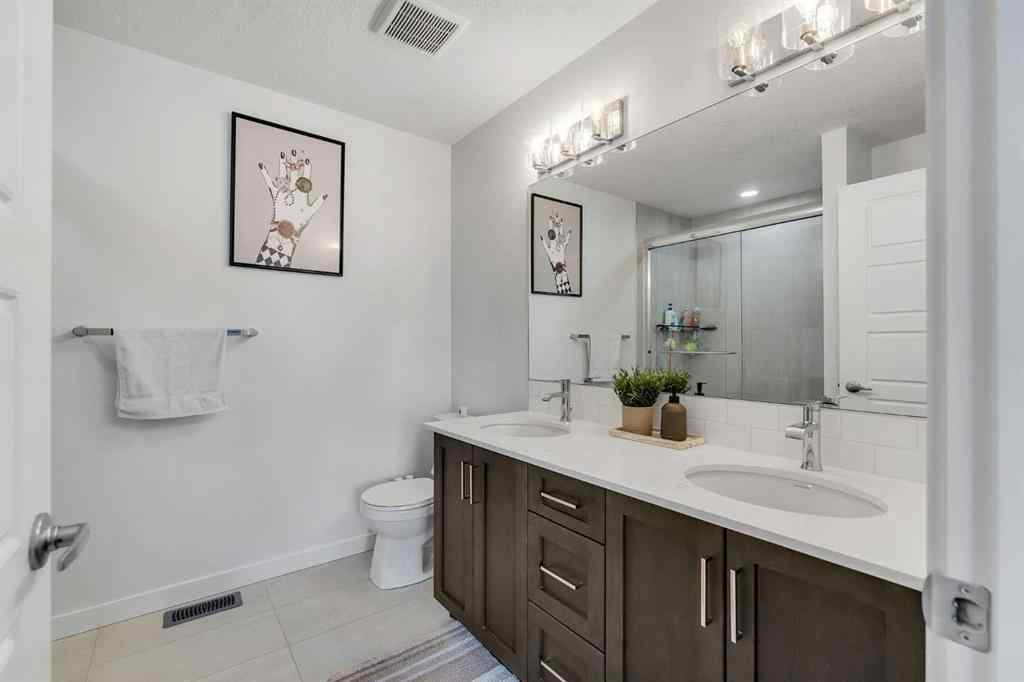 MLS® A2258813 - 72 Creekside Boulevard SW in Pine Creek Calgary, Residential