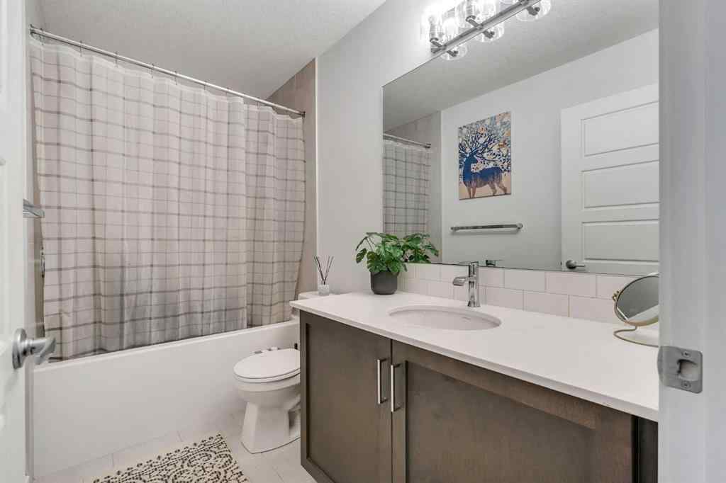 MLS® A2258813 - 72 Creekside Boulevard SW in Pine Creek Calgary, Residential