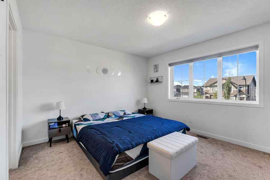 MLS® A2258813 - 72 Creekside Boulevard SW in Pine Creek Calgary, Residential