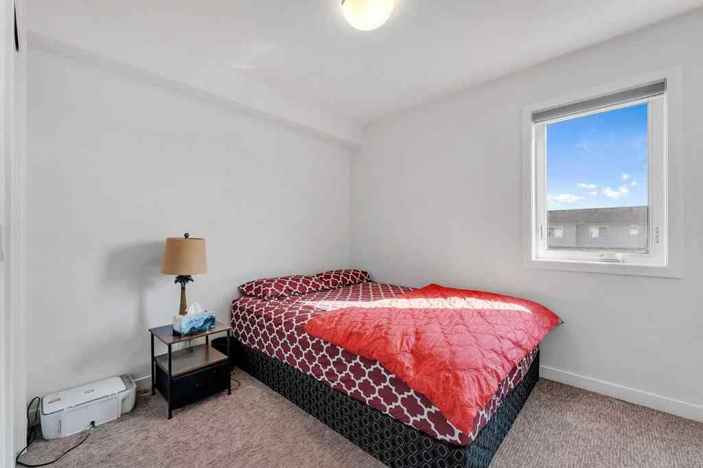 MLS® A2258813 - 72 Creekside Boulevard SW in Pine Creek Calgary, Residential