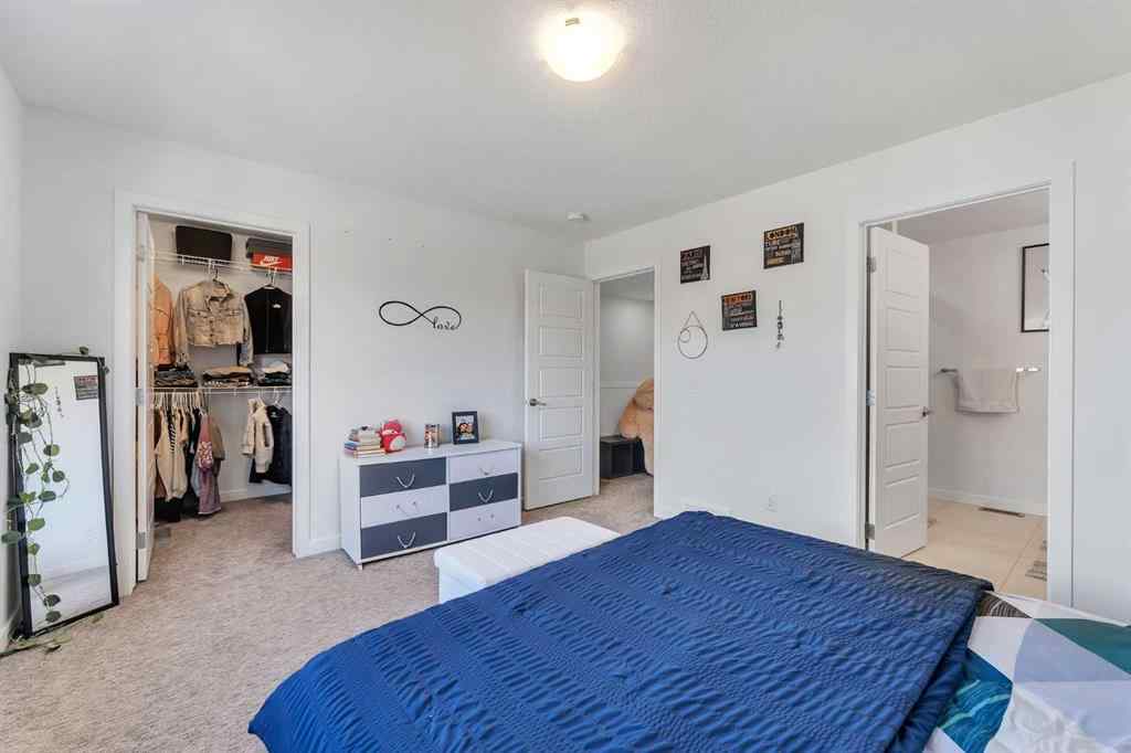 MLS® A2258813 - 72 Creekside Boulevard SW in Pine Creek Calgary, Residential