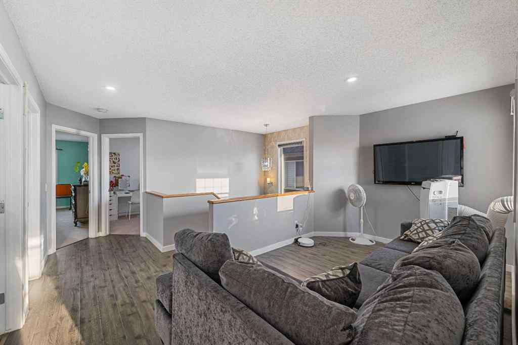 MLS® A2258818 - 17 Saddlecrest Crescent NE in Saddle Ridge Calgary, Residential
