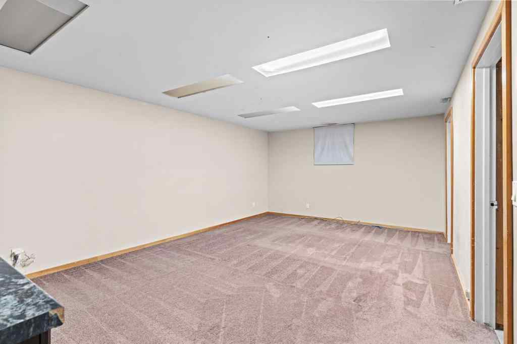 MLS® A2258825 - 212 Queen Anne Road SE in Queensland Calgary, Residential