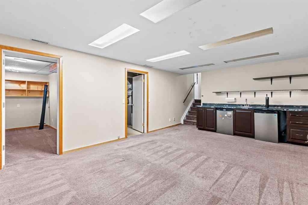 MLS® A2258825 - 212 Queen Anne Road SE in Queensland Calgary, Residential