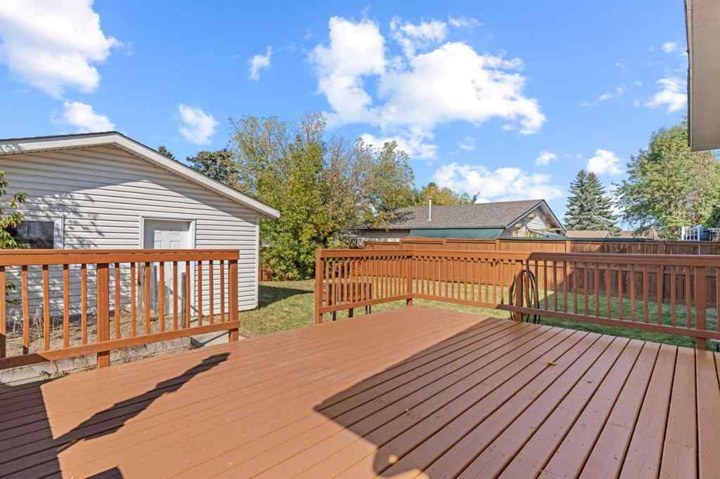 MLS® A2258825 - 212 Queen Anne Road SE in Queensland Calgary, Residential