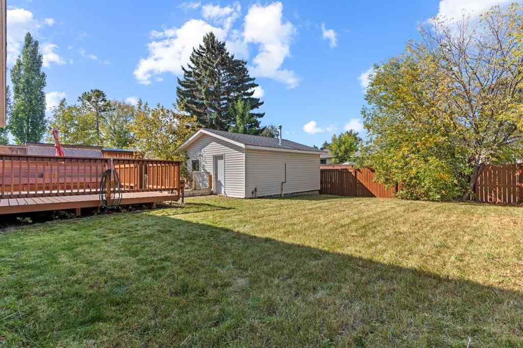 MLS® A2258825 - 212 Queen Anne Road SE in Queensland Calgary, Residential