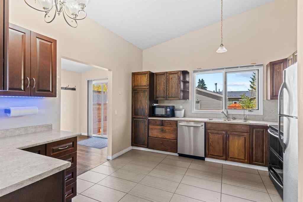 MLS® A2258825 - 212 Queen Anne Road SE in Queensland Calgary, Residential