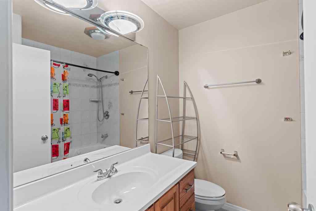 MLS® A2258825 - 212 Queen Anne Road SE in Queensland Calgary, Residential