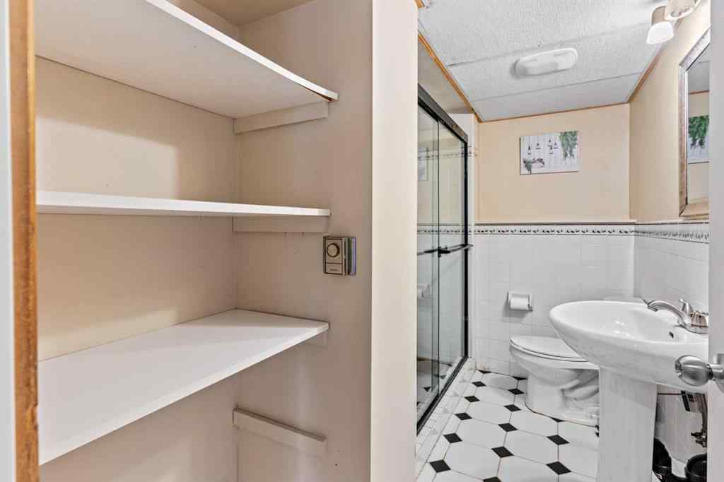 MLS® A2258825 - 212 Queen Anne Road SE in Queensland Calgary, Residential