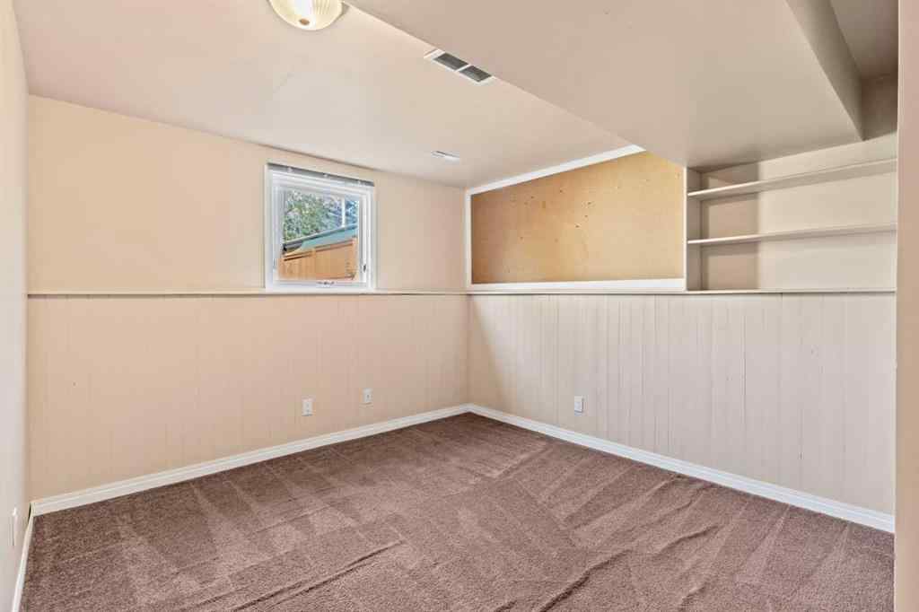 MLS® A2258825 - 212 Queen Anne Road SE in Queensland Calgary, Residential