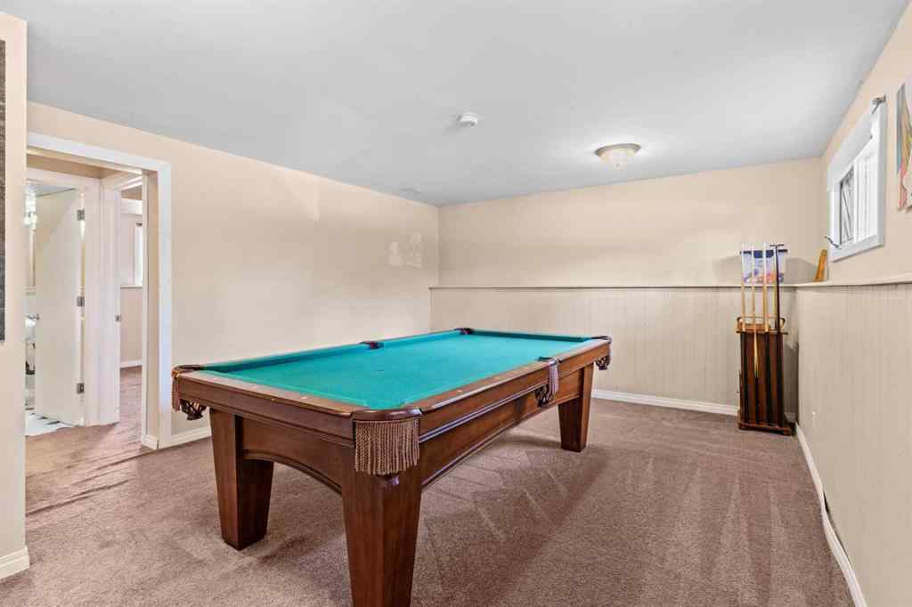 MLS® A2258825 - 212 Queen Anne Road SE in Queensland Calgary, Residential