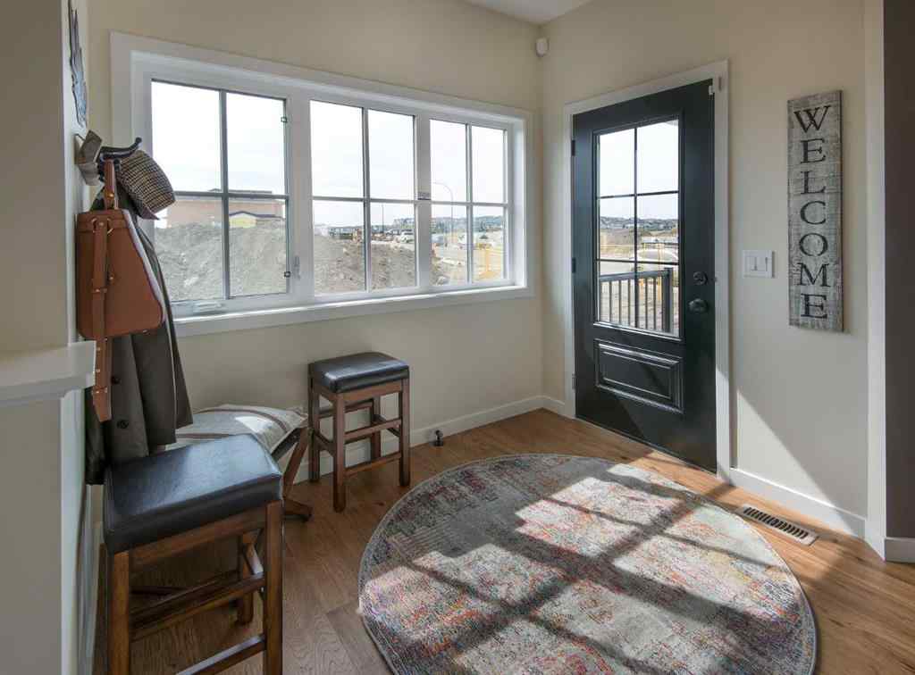 MLS® A2258867 - 604 Reynolds Crescent SW in Coopers Crossing Airdrie, Residential