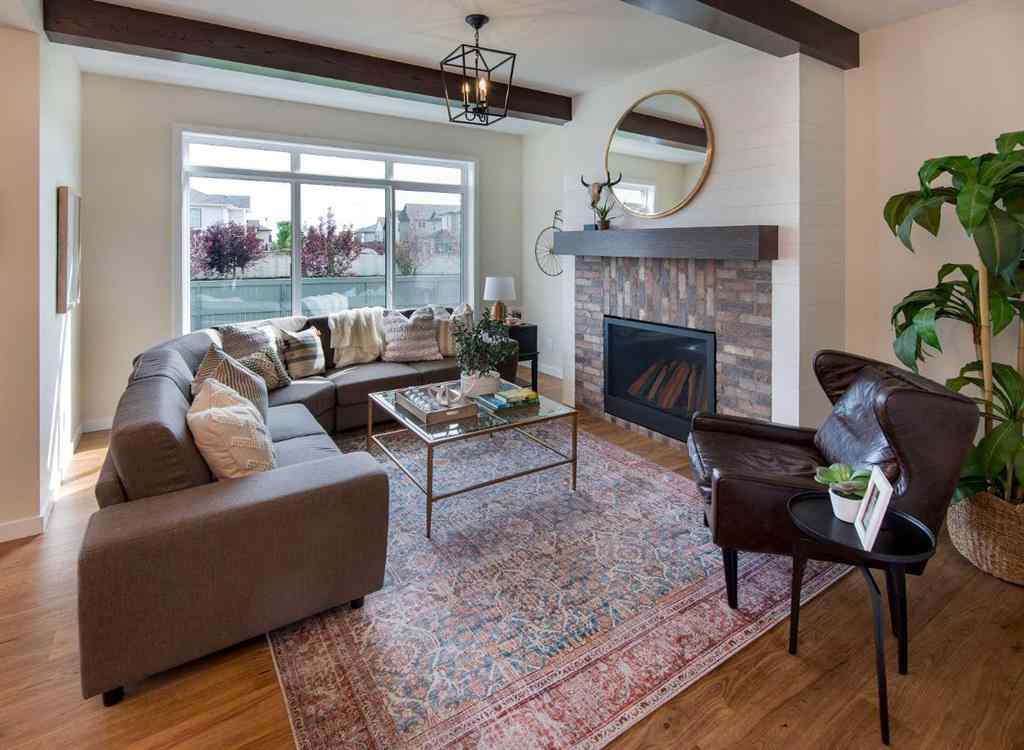 MLS® A2258867 - 604 Reynolds Crescent SW in Coopers Crossing Airdrie, Residential