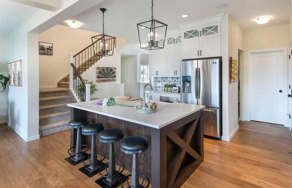 MLS® A2258867 - 604 Reynolds Crescent SW in Coopers Crossing Airdrie, Residential