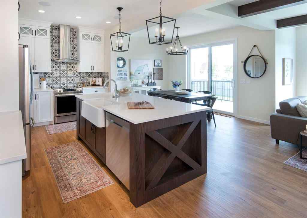 MLS® A2258867 - 604 Reynolds Crescent SW in Coopers Crossing Airdrie, Residential