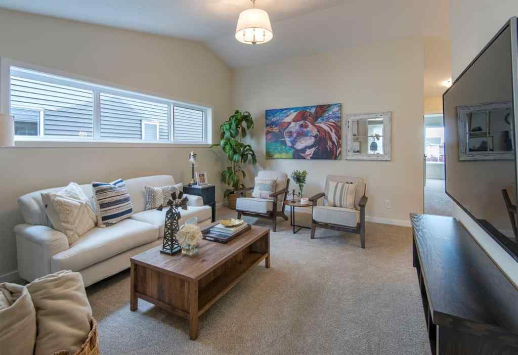 MLS® A2258867 - 604 Reynolds Crescent SW in Coopers Crossing Airdrie, Residential