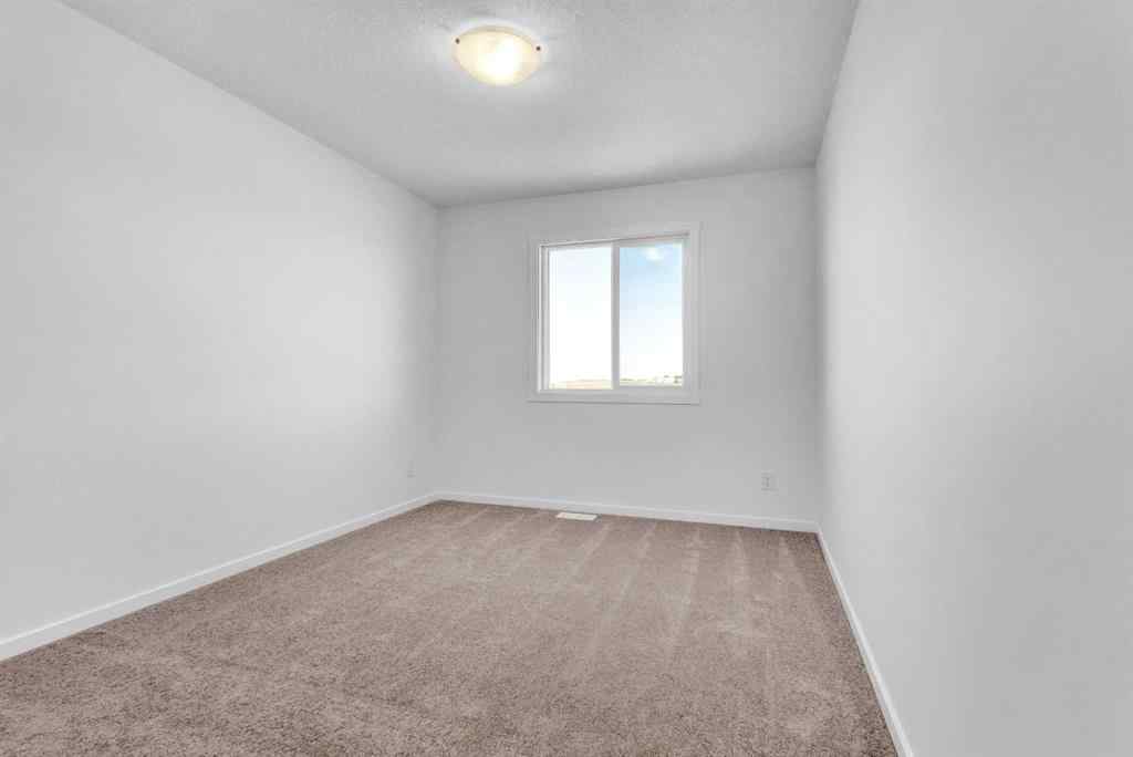 MLS® A2258881 - 71 Carringford Road NW in Carrington Calgary, Residential