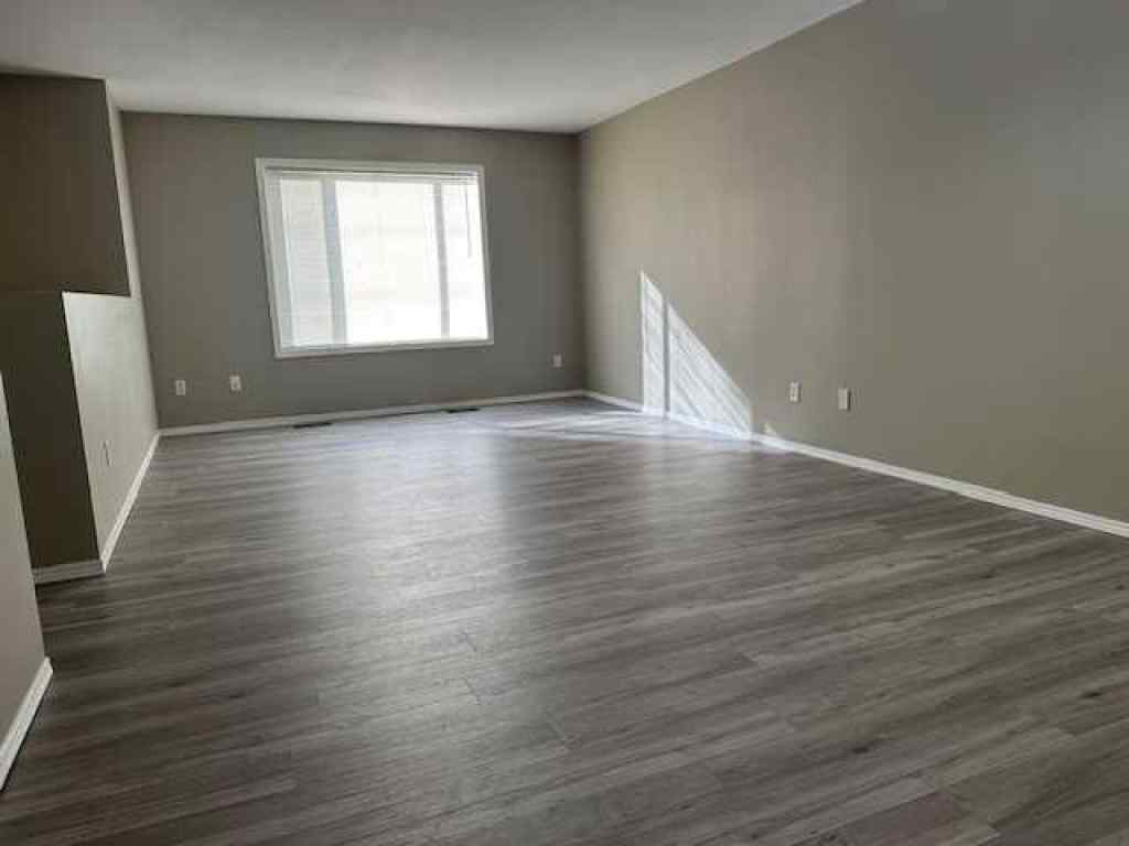 MLS® A2258891 - Unit #A 5913 52 Avenue  in Riverside Meadows Red Deer, Residential