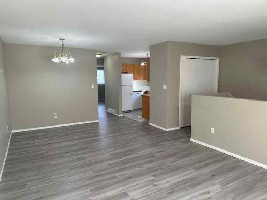 MLS® A2258891 - Unit #A 5913 52 Avenue  in Riverside Meadows Red Deer, Residential