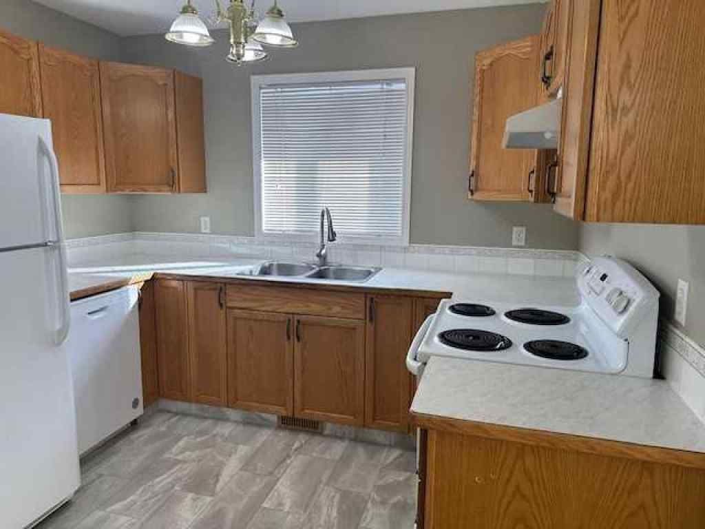 MLS® A2258891 - Unit #A 5913 52 Avenue  in Riverside Meadows Red Deer, Residential