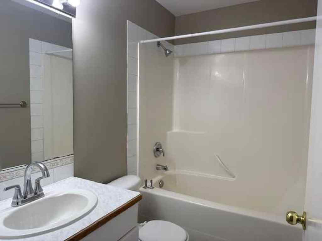 MLS® A2258891 - Unit #A 5913 52 Avenue  in Riverside Meadows Red Deer, Residential