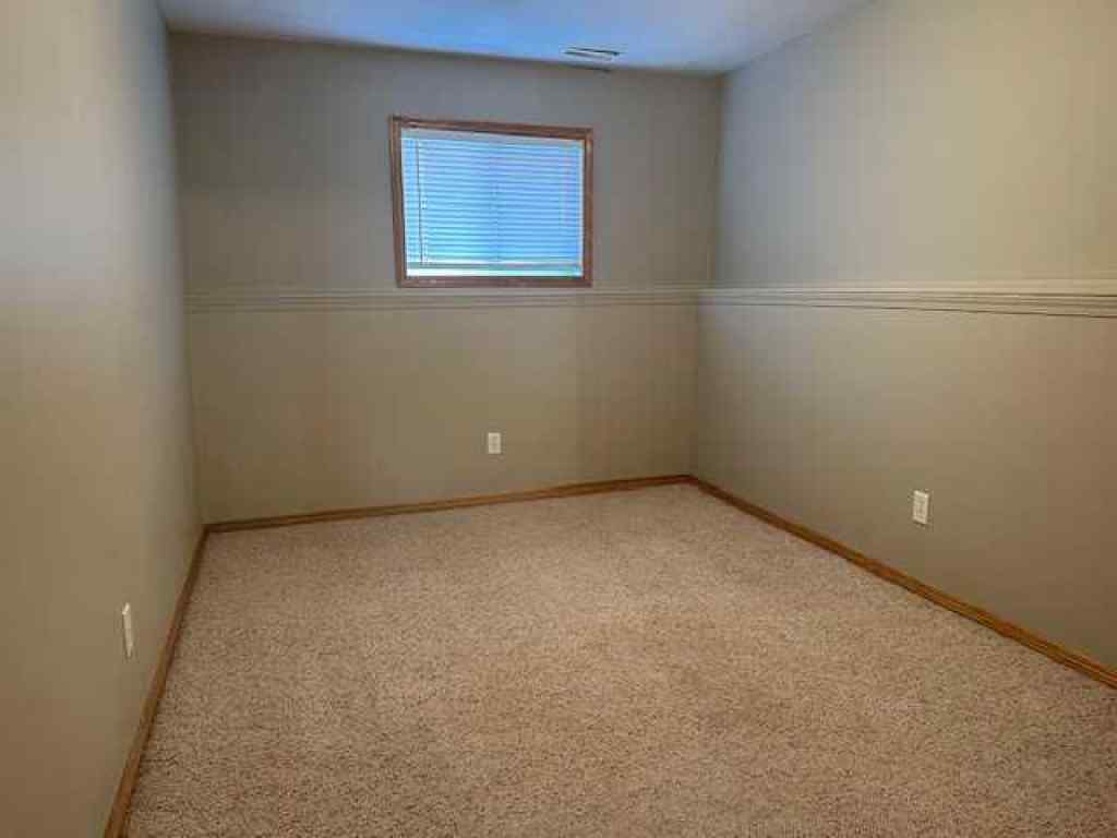 MLS® A2258891 - Unit #A 5913 52 Avenue  in Riverside Meadows Red Deer, Residential
