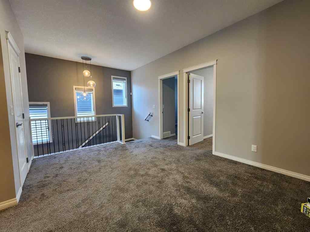 MLS® A2258901 - 292 Lucas Boulevard NW in Livingston Calgary, Residential