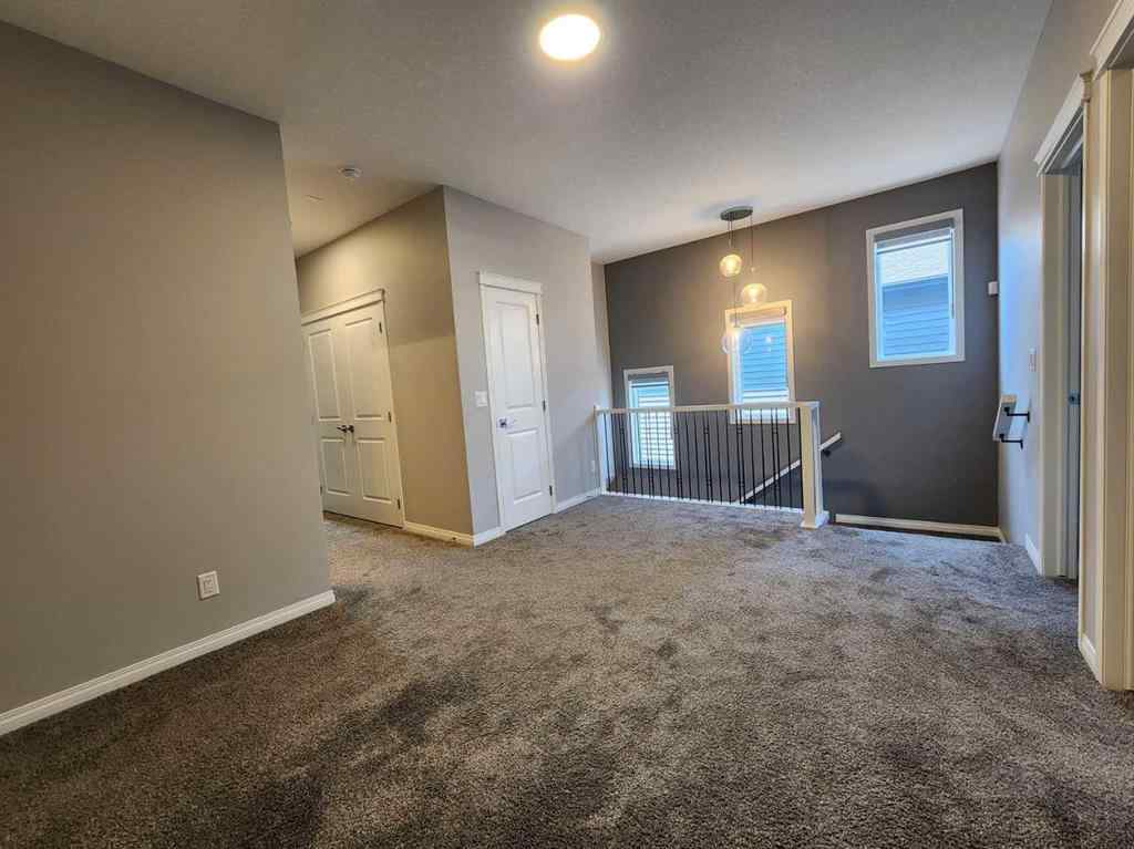 MLS® A2258901 - 292 Lucas Boulevard NW in Livingston Calgary, Residential