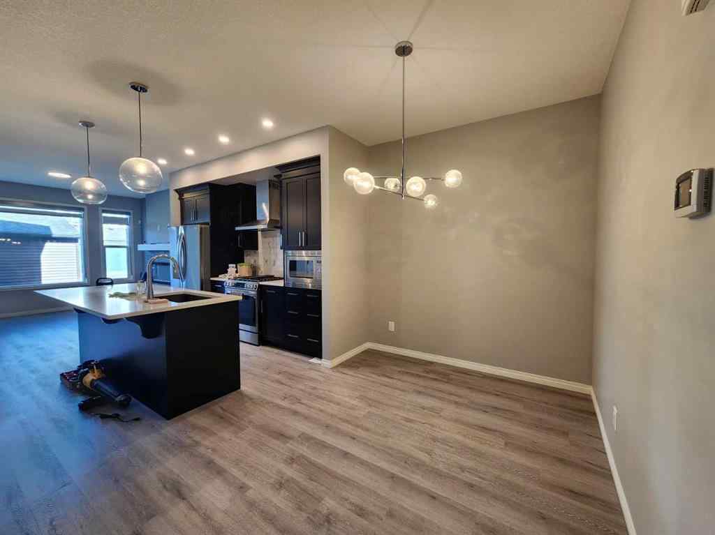 MLS® A2258901 - 292 Lucas Boulevard NW in Livingston Calgary, Residential