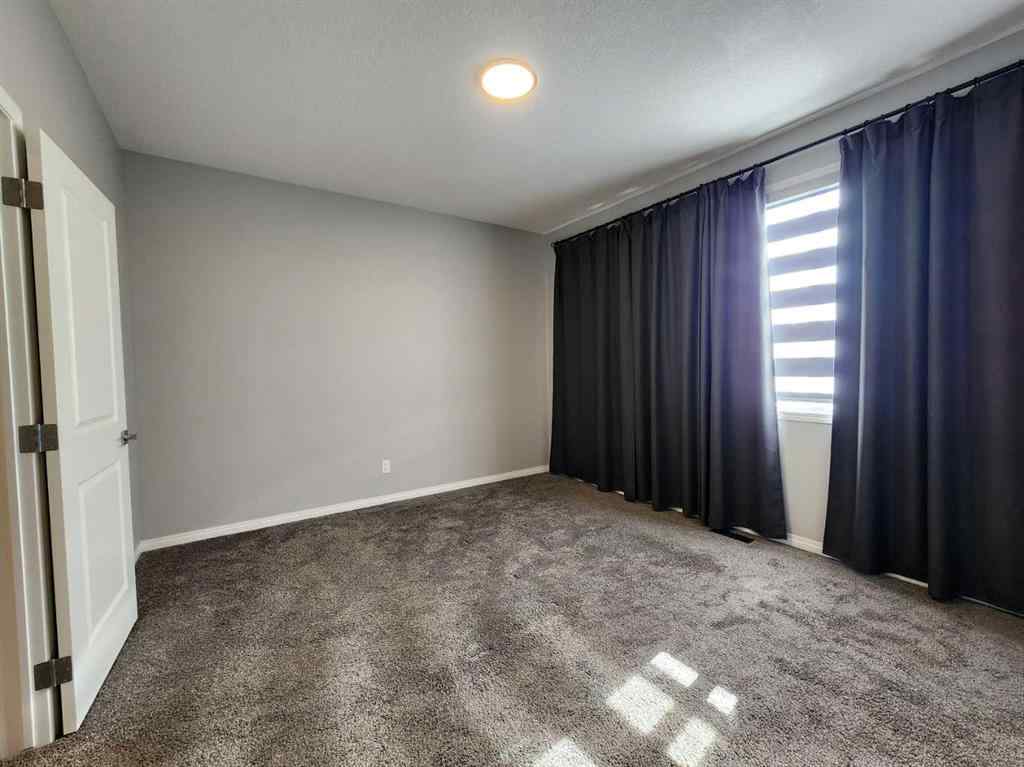 MLS® A2258901 - 292 Lucas Boulevard NW in Livingston Calgary, Residential
