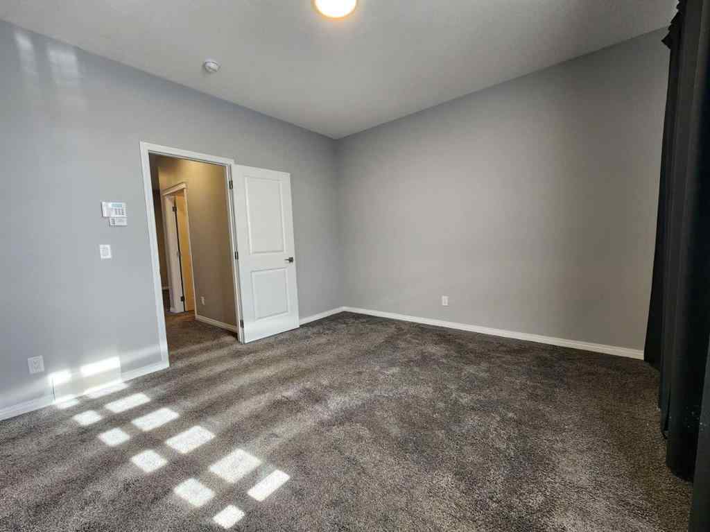 MLS® A2258901 - 292 Lucas Boulevard NW in Livingston Calgary, Residential