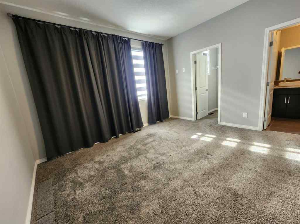MLS® A2258901 - 292 Lucas Boulevard NW in Livingston Calgary, Residential