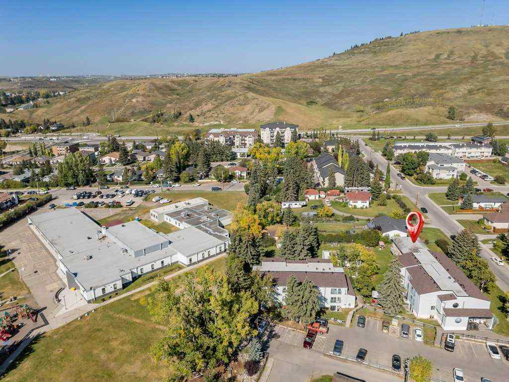 MLS® A2258907 - 217 Ross Avenue  in East End Cochrane, Residential