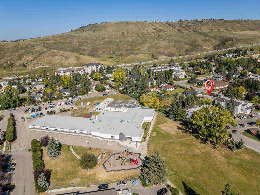 MLS® A2258907 - 217 Ross Avenue  in East End Cochrane, Residential