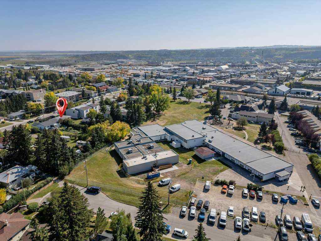MLS® A2258907 - 217 Ross Avenue  in East End Cochrane, Residential