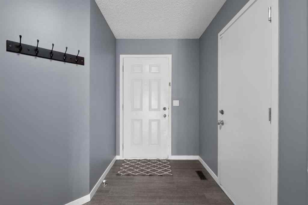 MLS® A2258916 - 203 Cranberry Green SE in Cranston Calgary, Residential