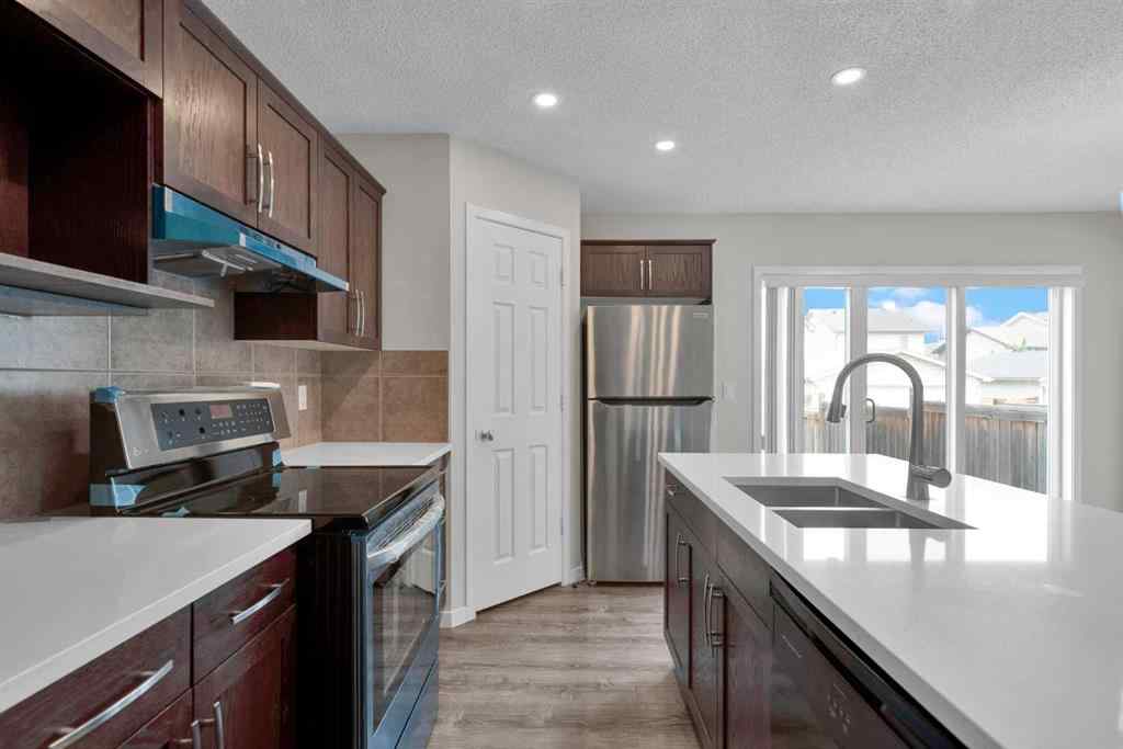 MLS® A2258916 - 203 Cranberry Green SE in Cranston Calgary, Residential