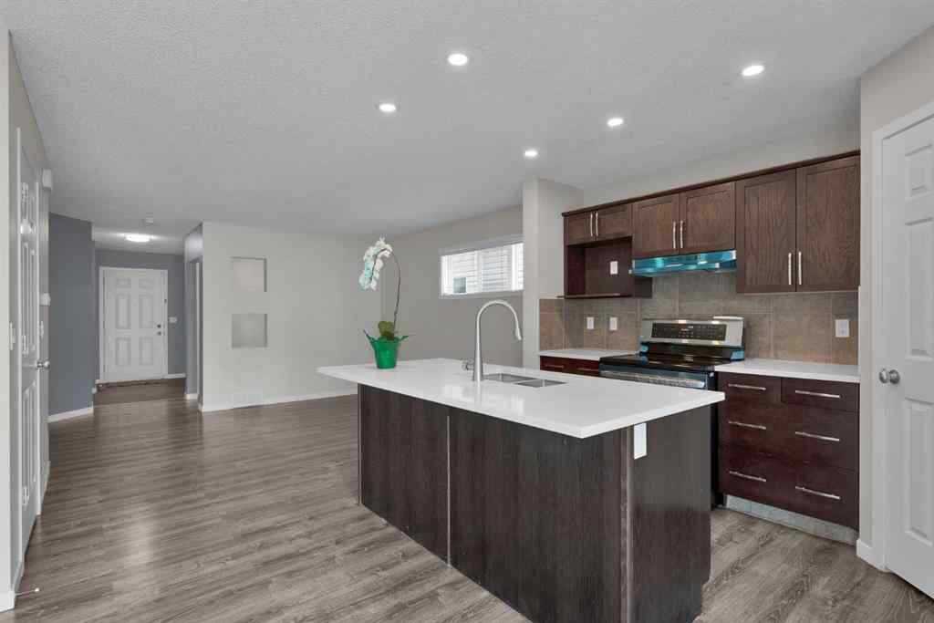 MLS® A2258916 - 203 Cranberry Green SE in Cranston Calgary, Residential