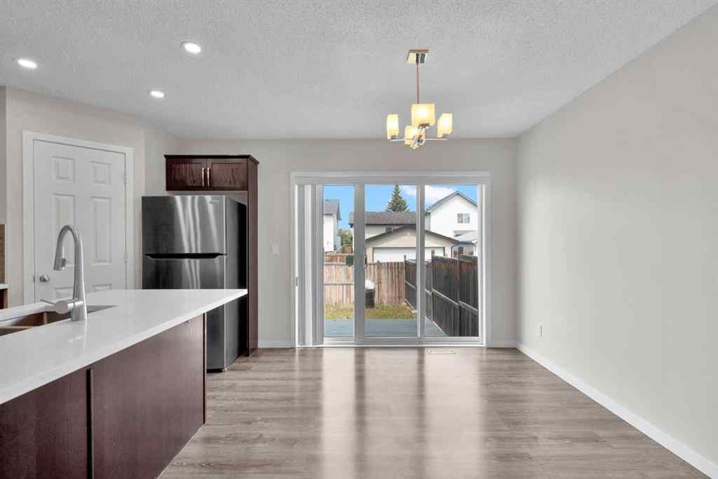 MLS® A2258916 - 203 Cranberry Green SE in Cranston Calgary, Residential