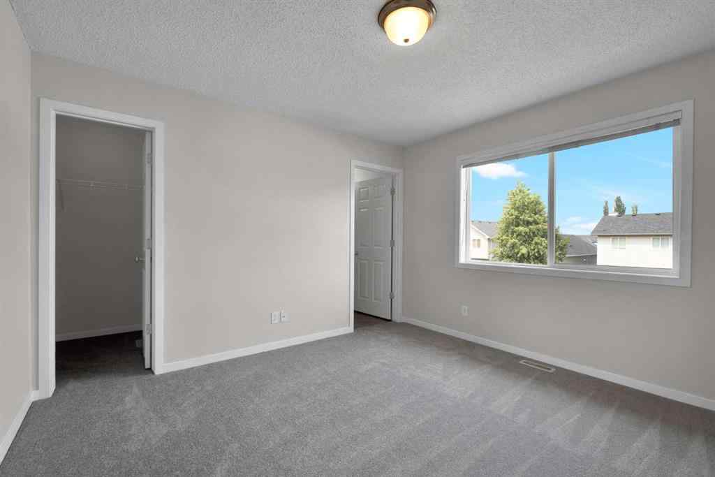 MLS® A2258916 - 203 Cranberry Green SE in Cranston Calgary, Residential