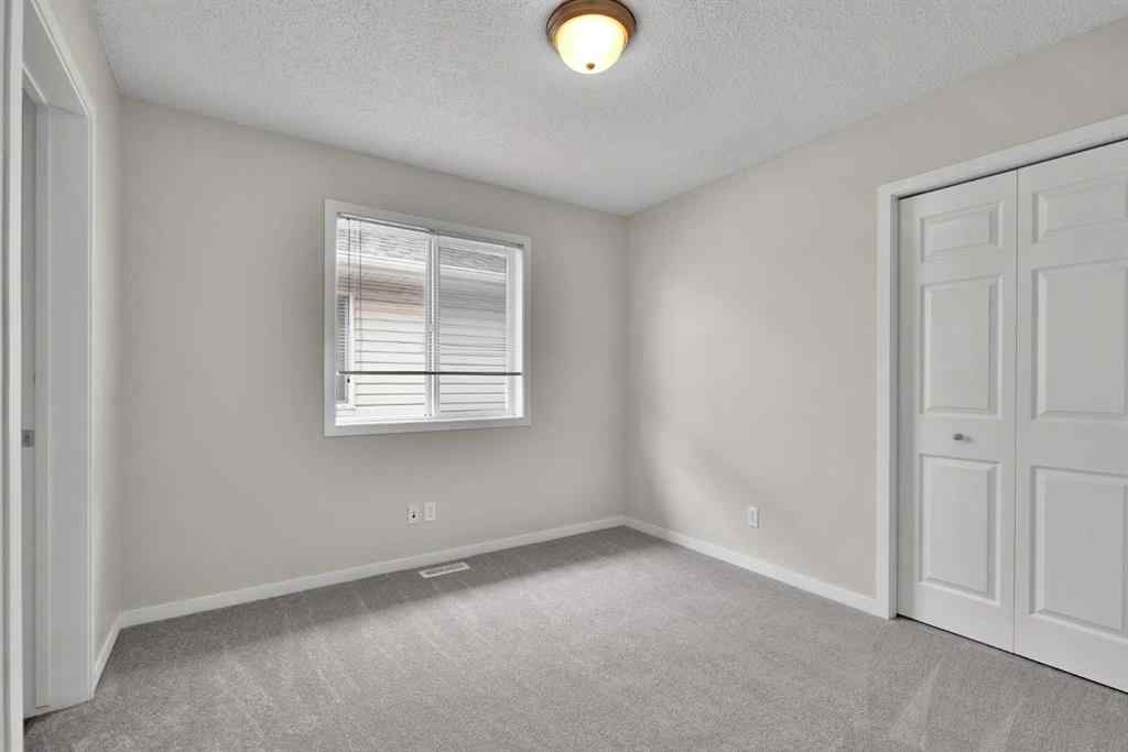 MLS® A2258916 - 203 Cranberry Green SE in Cranston Calgary, Residential