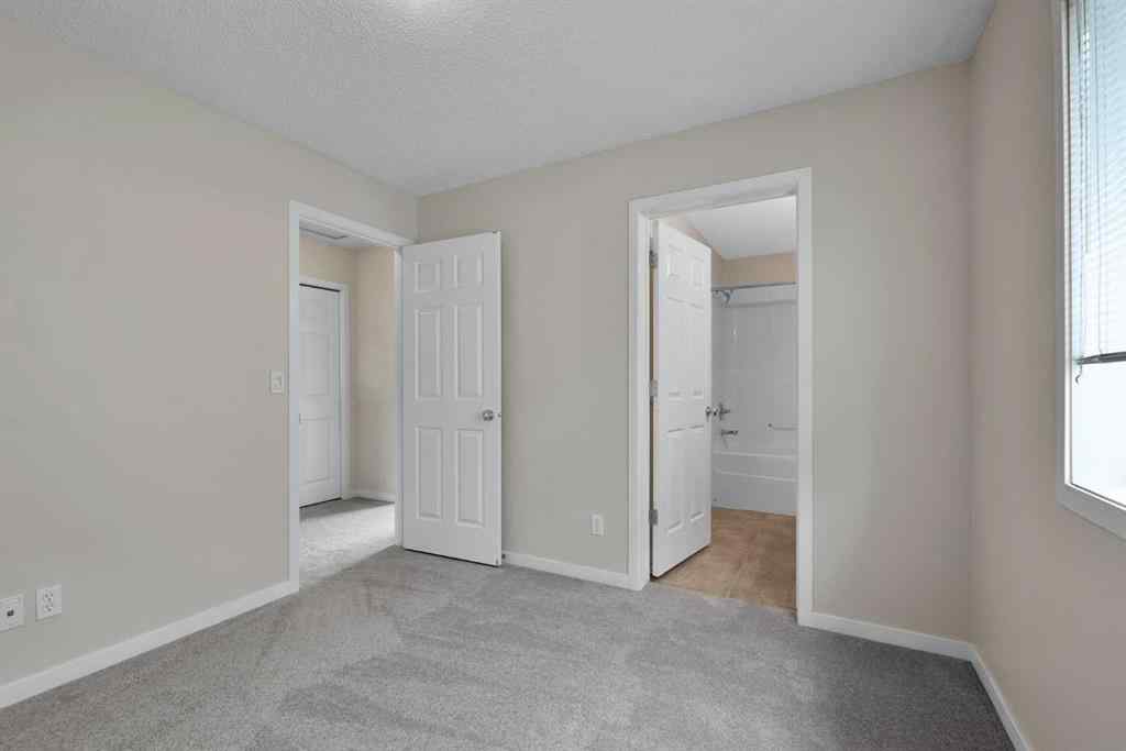 MLS® A2258916 - 203 Cranberry Green SE in Cranston Calgary, Residential