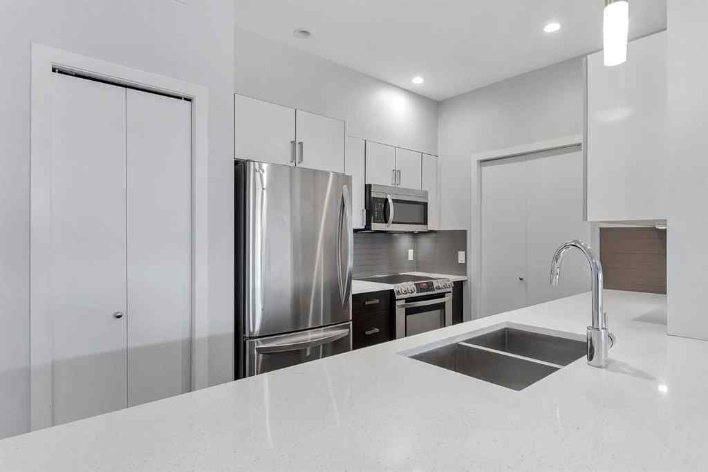 MLS® A2258918 - Unit #212 10 Auburn Bay Link SE in Auburn Bay Calgary, Residential