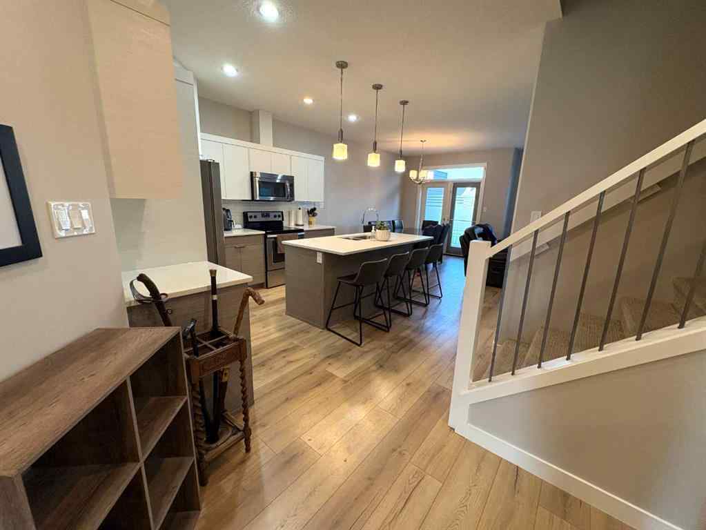 MLS® A2258936 - Unit #2 77 Aquitania Circle W in The Crossings Lethbridge, Residential