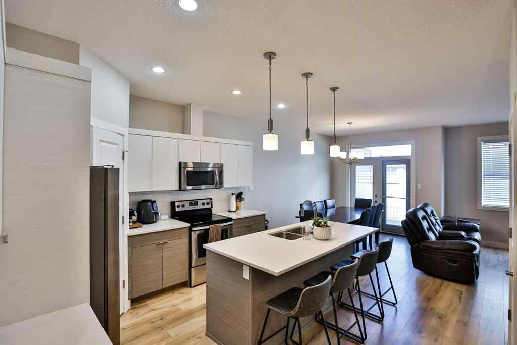 MLS® A2258936 - Unit #2 77 Aquitania Circle W in The Crossings Lethbridge, Residential